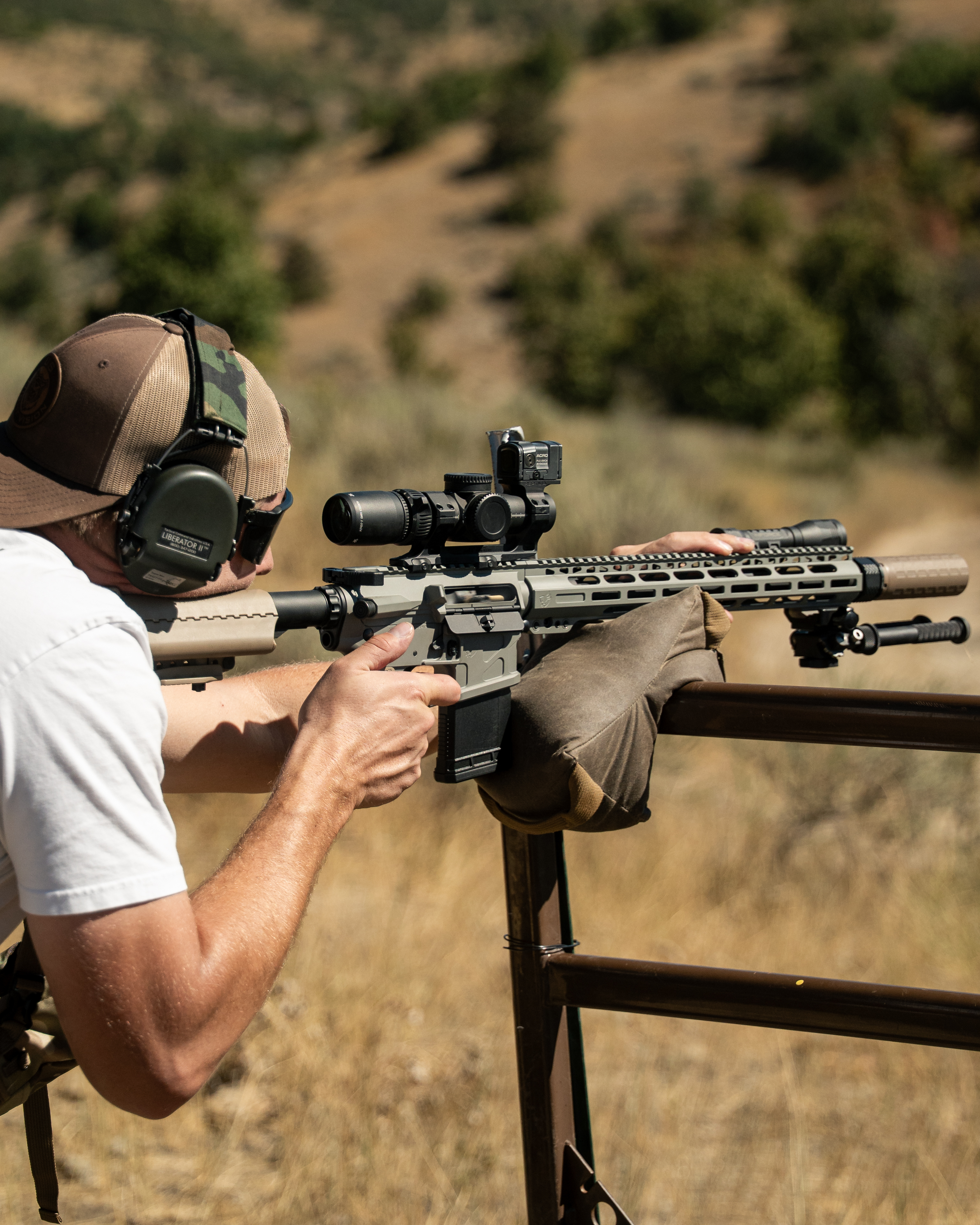 Shooter engaging a target with a precision AR rifle at a SPARC match